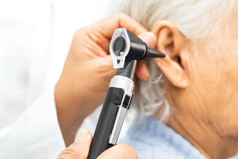 Audiologist performing a professional hearing test in Atlanta clinic